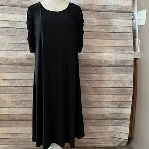 JBS woman’s dress No Tag for size (see approximate measurements)